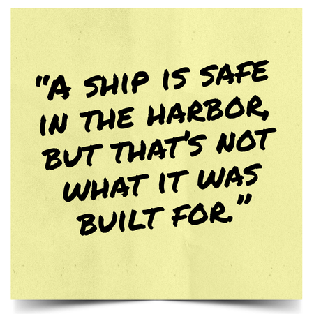Yellow sticky note with black handwritten quote: 'A ship is safe in the harbor, but that's not what it was built for.'